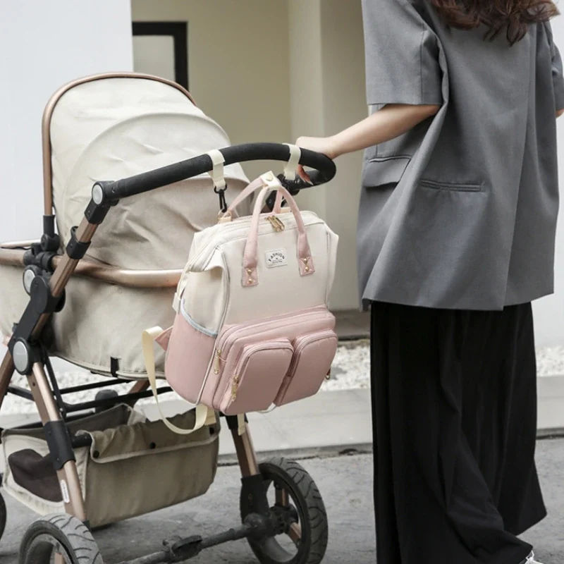 cute multifunctional lightweight pink rucksack attached to a stroller rucksack backpack