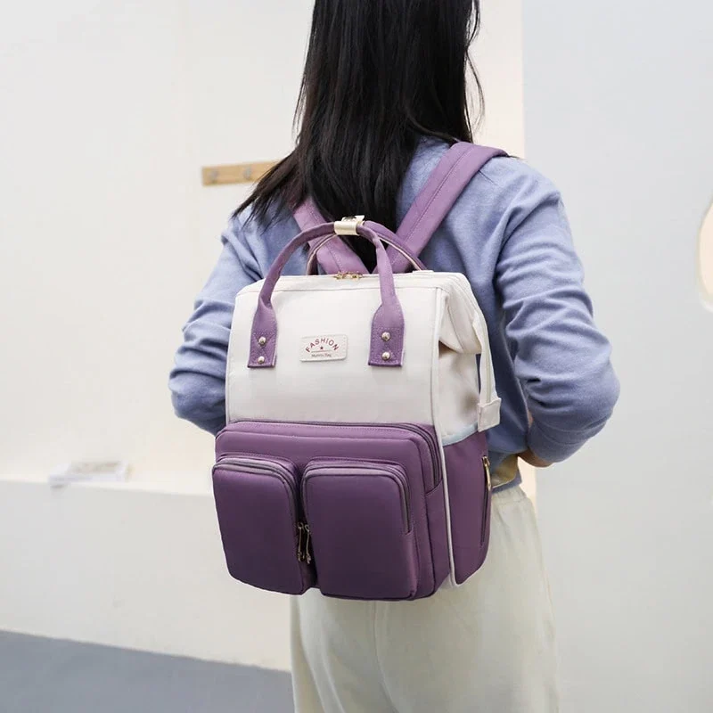 mother wearing her rucksack cute lightweight multifunctional on her back rucksack backpack