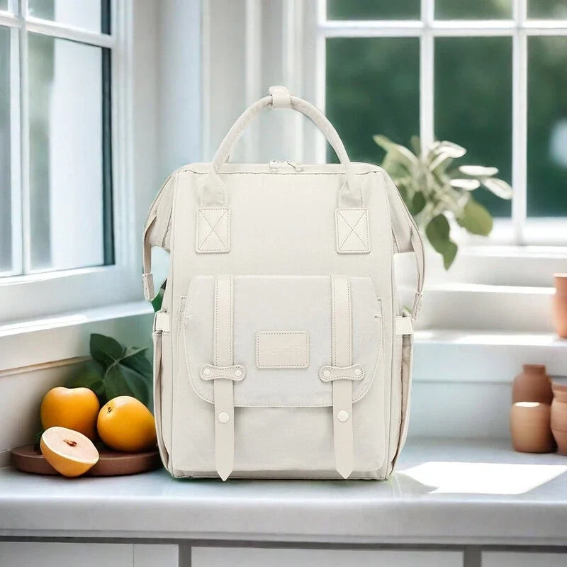 white rucksack mother's in a kitchen with wipes hook rucksack backpack